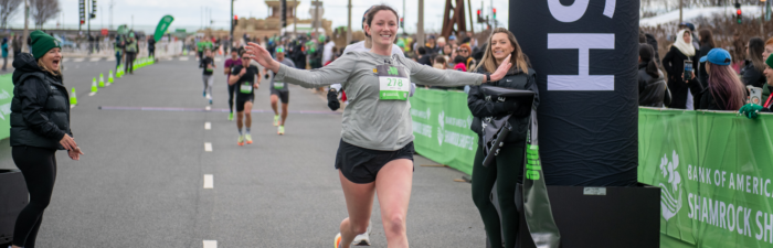 Participant winning The Mile at the 2025 Bank of America Shamrock Shuffle
